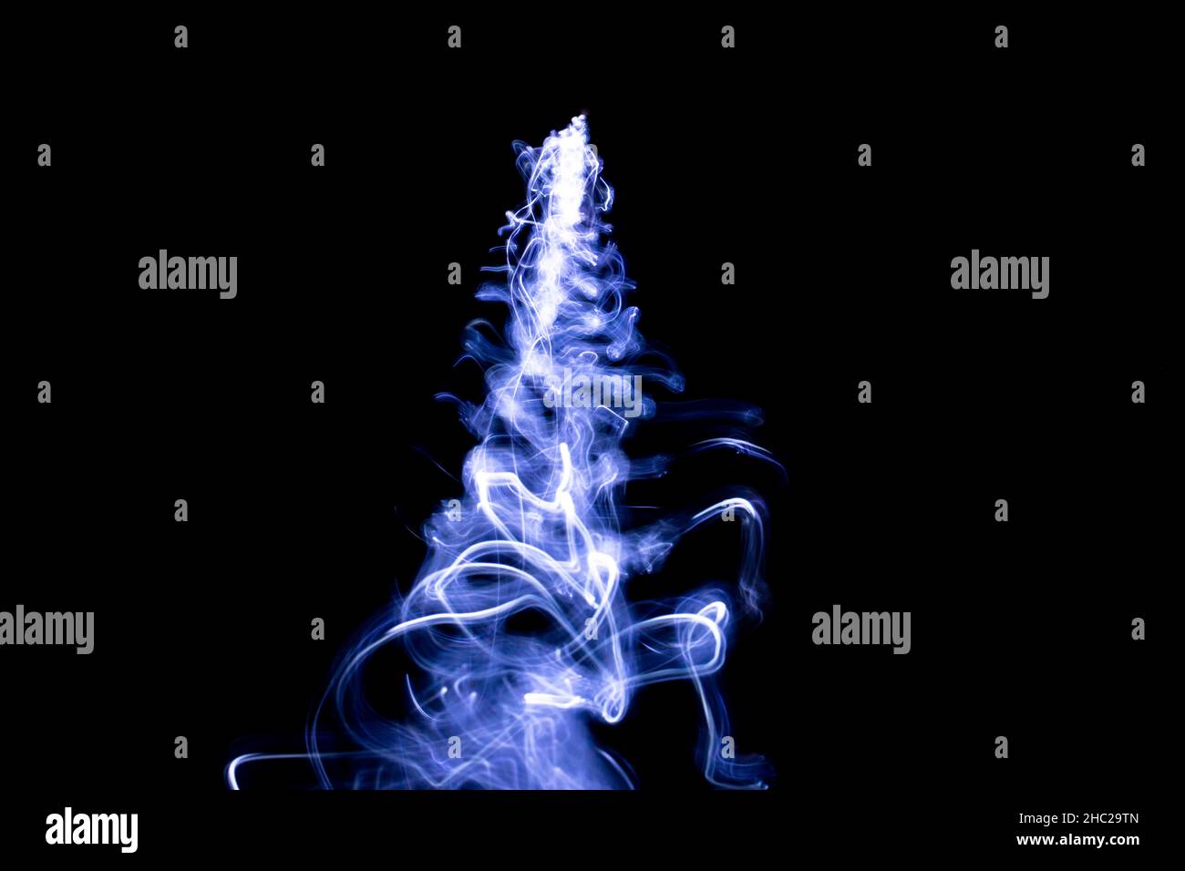 Blue smoke on a black background Stock Photo