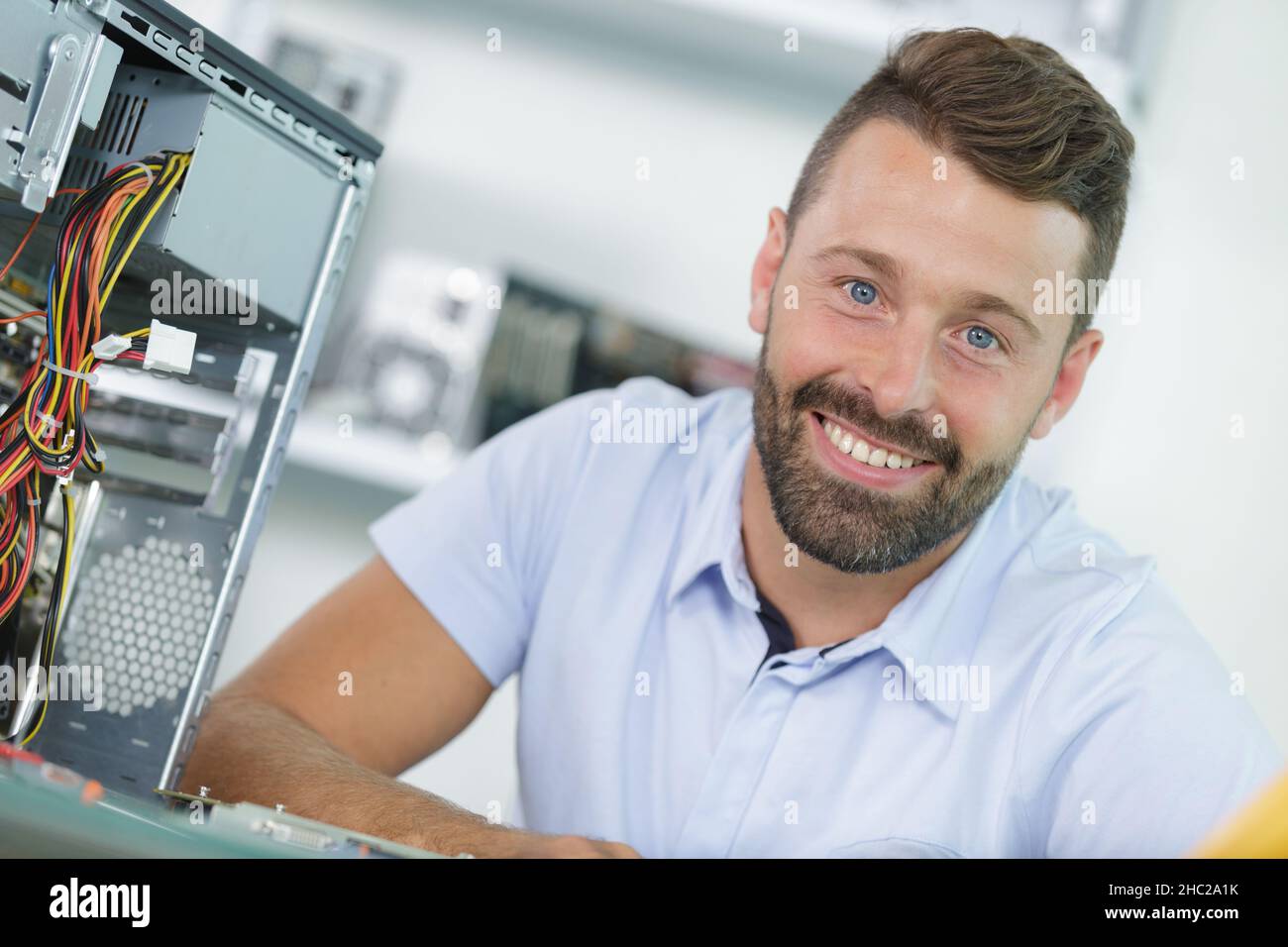small business owner of a computer repair store Stock Photo Alamy