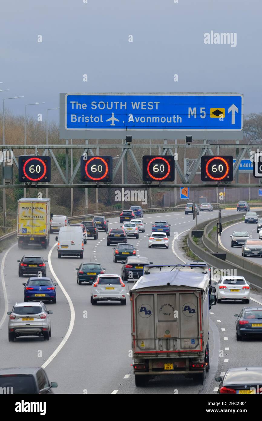 Bristol, UK. 23rd Dec, 2021. Christmas getaway traffic causes congestion on the M5 at Bristol. The RAC has predicted 27 million car journeys on the run up to Christmas. Pictured, traffic reduced to 60MPH on the managed motorway between Junctions 16 and 17. Credit: JMF News/Alamy Live News Stock Photo