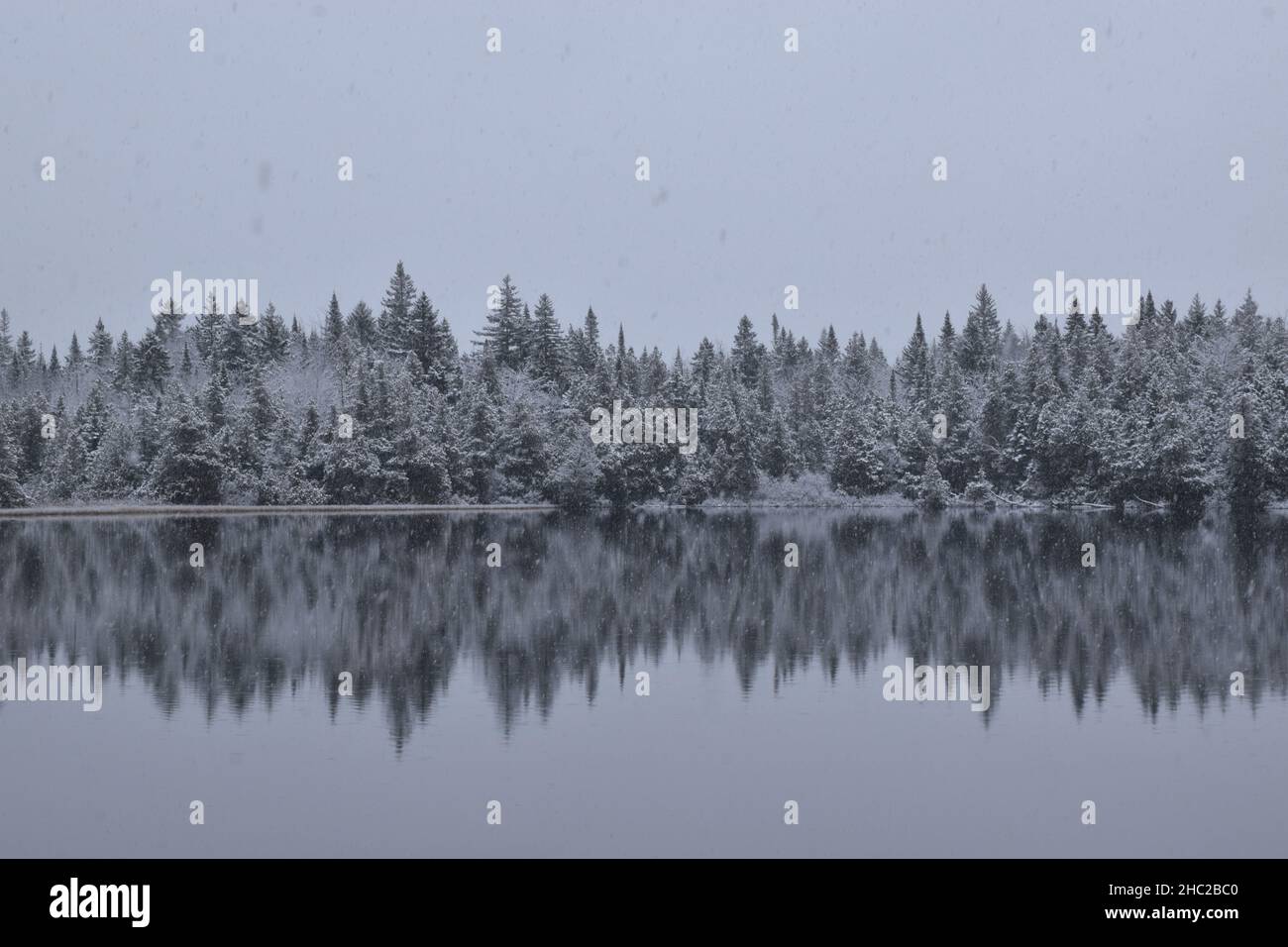 First snow on the lake, Sainte-Apolline, Québec, Canada Stock Photo