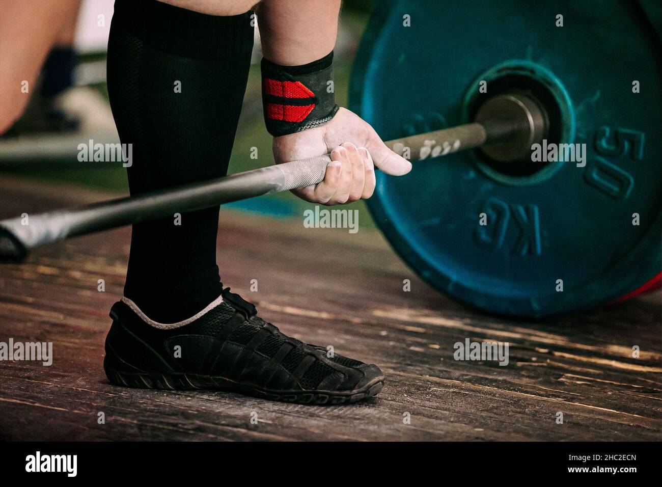 close-up athlete and barbell exercise deadlift Stock Photo