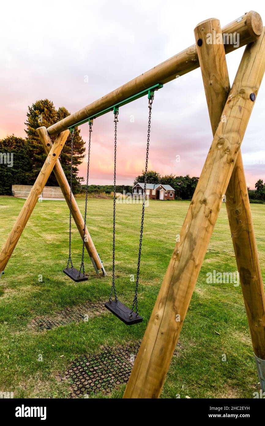 Playground swings,playground,wooden sings,childrens playground,childs  playground,swing set,play swings,play ground,swing,swings Stock Photo -  Alamy