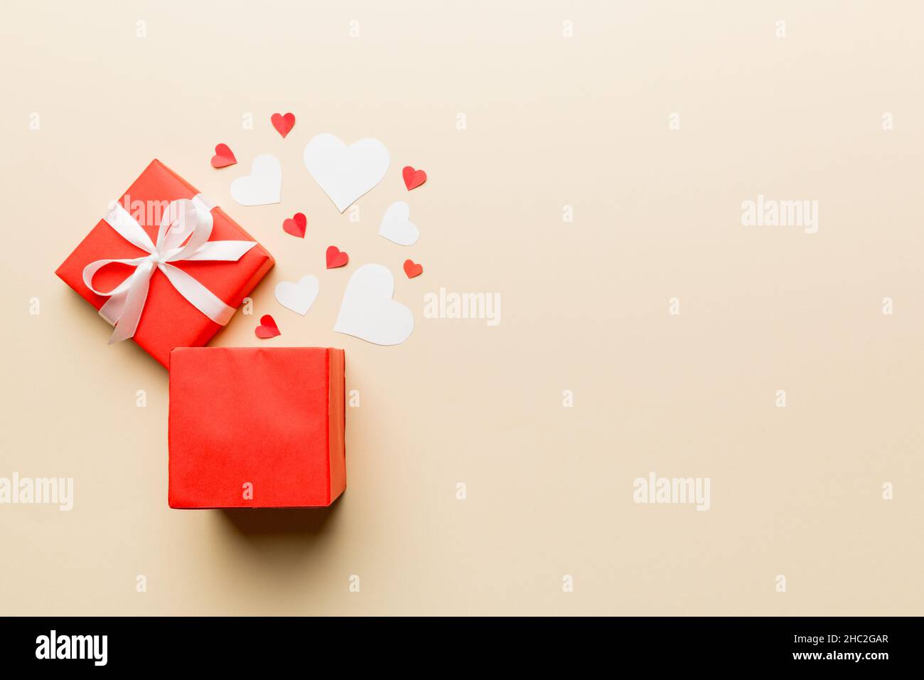 Happy valentines day opened heart shape gift box with small hearts, on ...