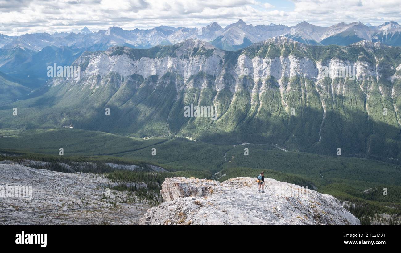 Hiking in Canadian Rockies, beautiful mountain range surrounding environment Stock Photo