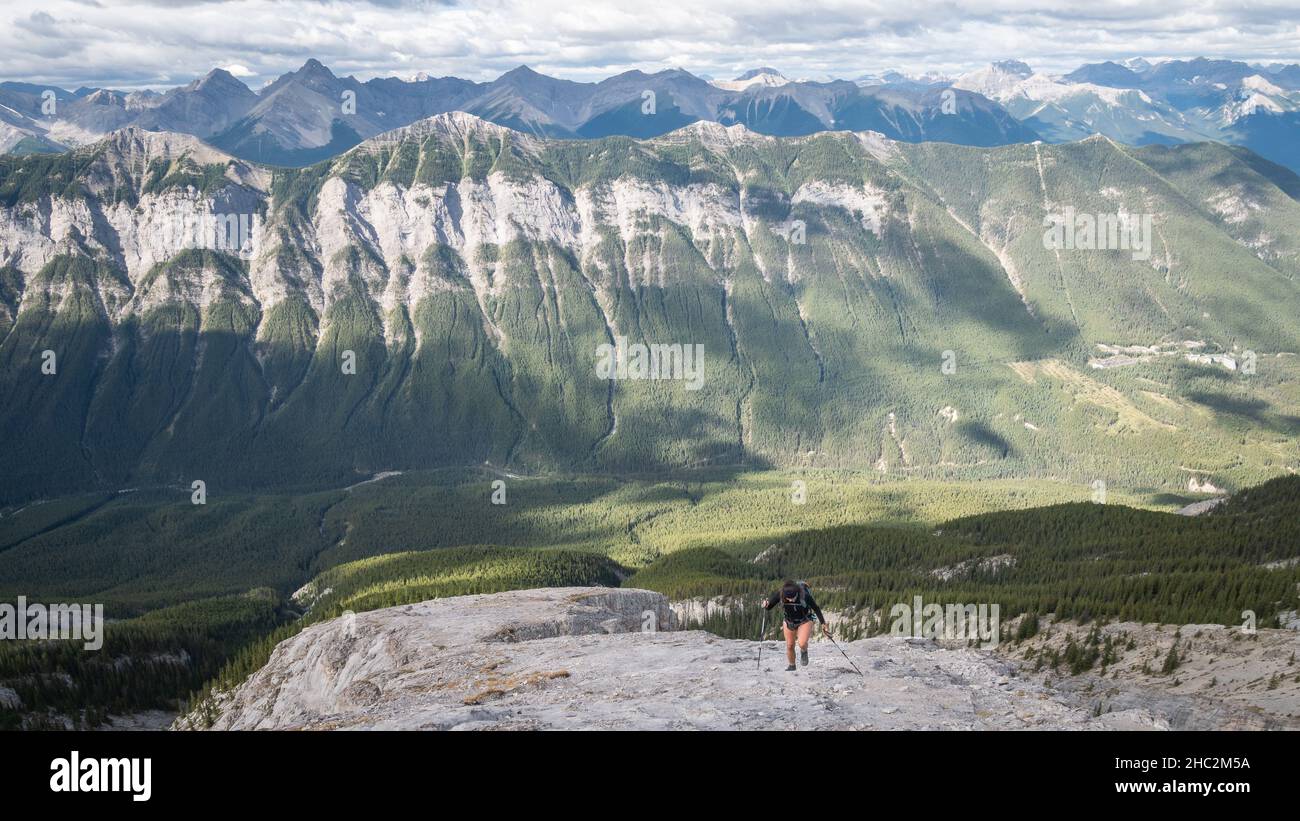 Hiking in Canadian Rockies, beautiful mountain range surrounding environment Stock Photo