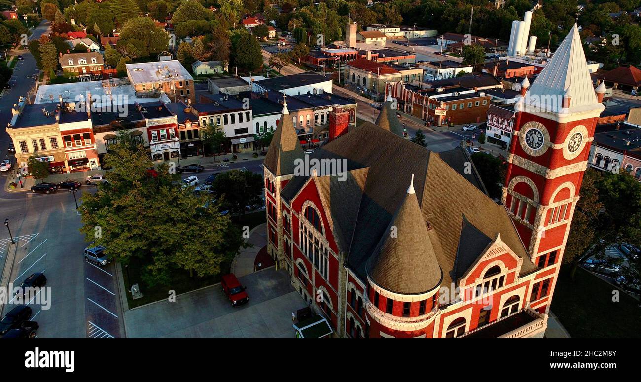 Aerial view at sunset of Historic 1844 Courthouse with clock tower in the center of the Monroe