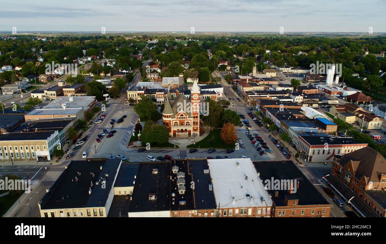 Aerial view at sunset of Historic 1844 Courthouse with clock tower in the center of the Monroe