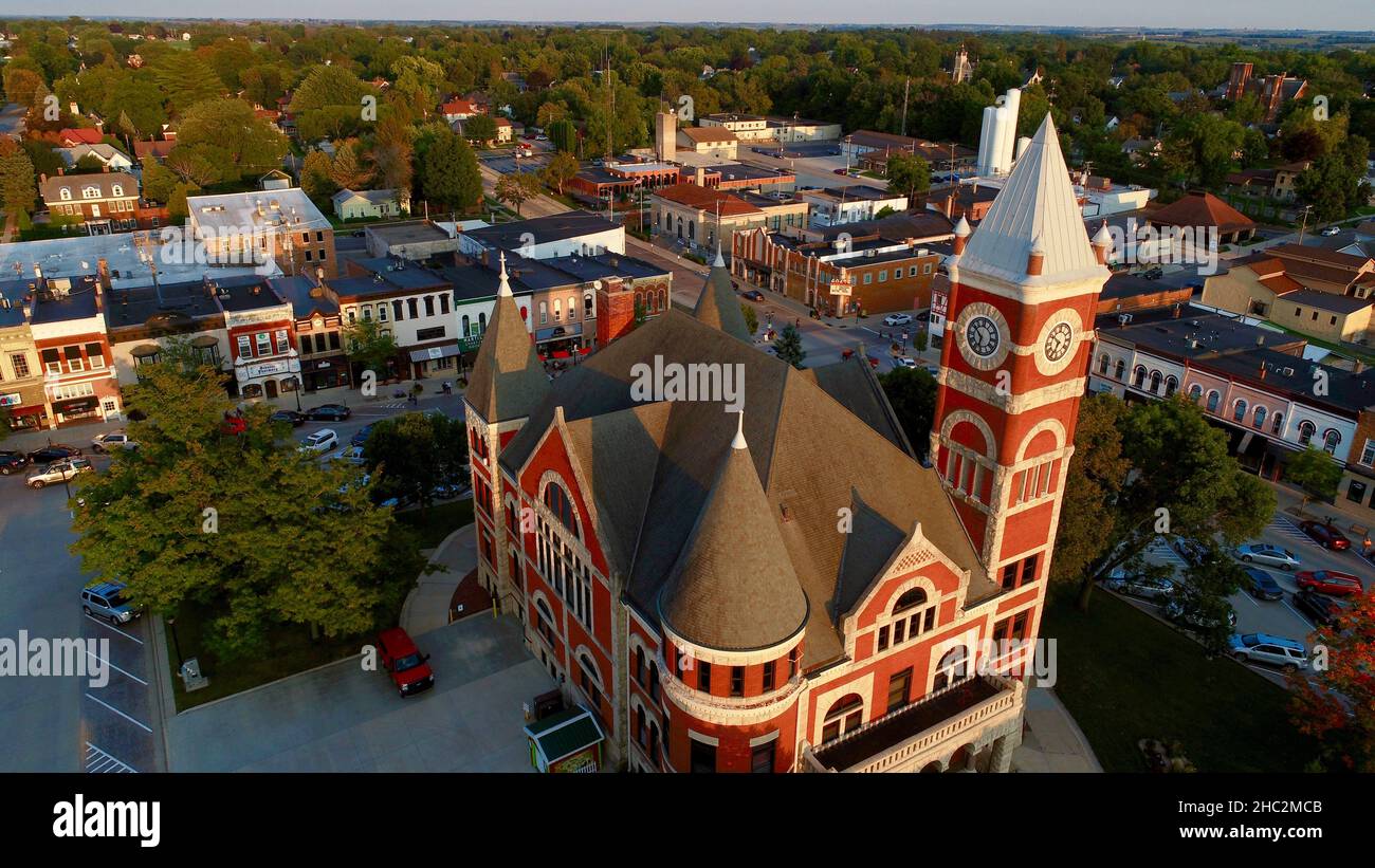 Aerial view at sunset of Historic 1844 Courthouse with clock tower in the center of the Monroe