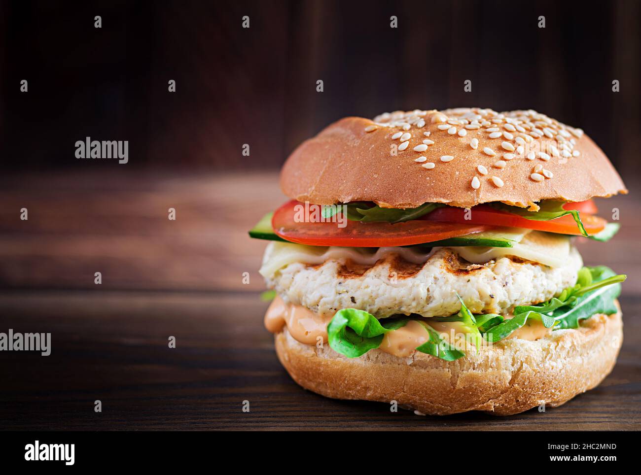 https://c8.alamy.com/comp/2HC2MND/big-sandwich-hamburger-burger-with-turkey-meat-tomato-cucumber-and-lettuce-2HC2MND.jpg