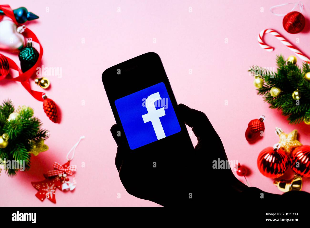 In this photo illustration a Facebook logo seen displayed on a smartphone. Stock Photo