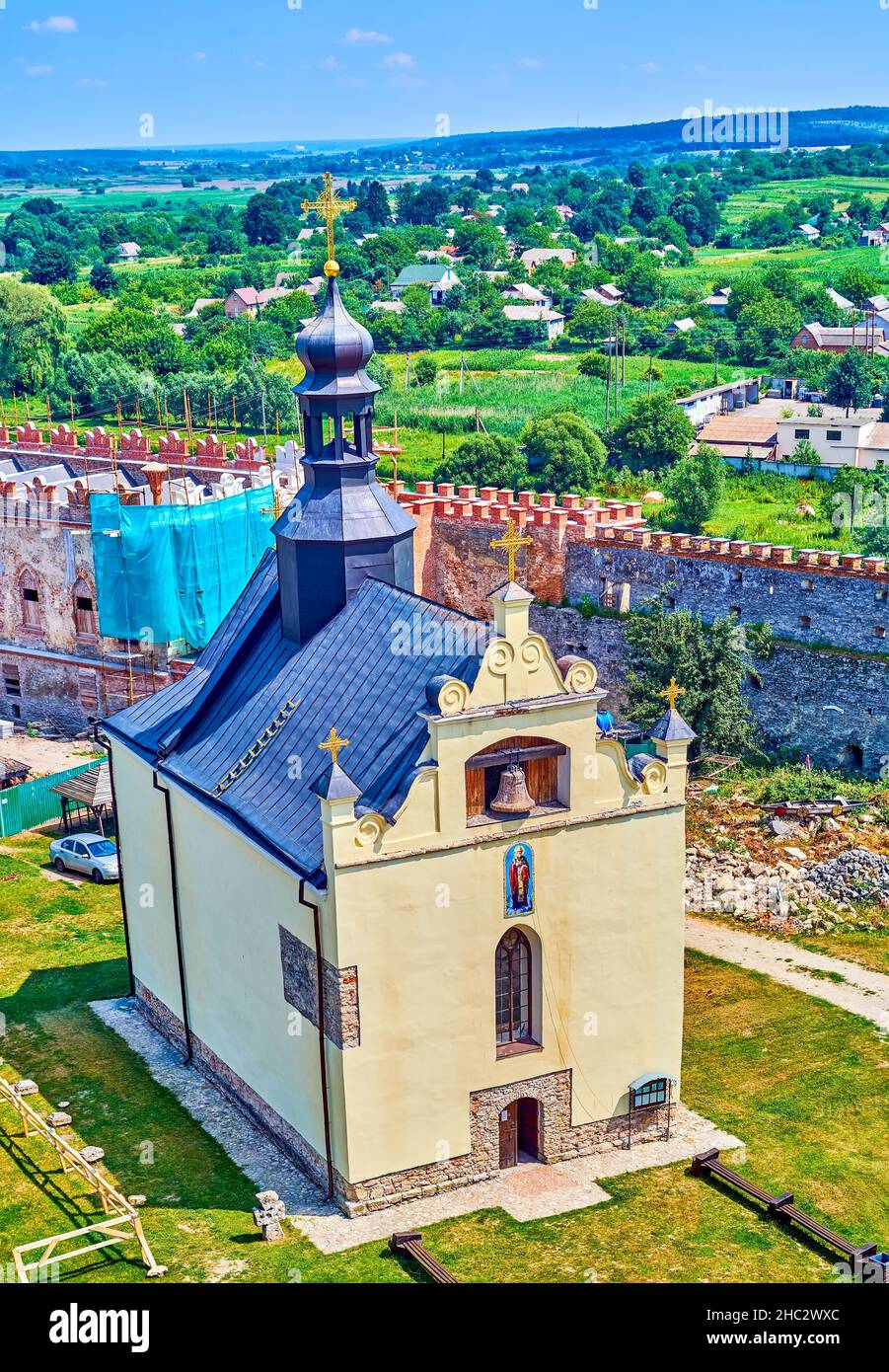 The scenic St Nicholas Church in courtyard of medieval Medzhybizh Castle, Ukraine Stock Photo