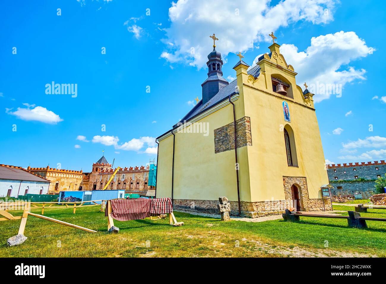 The modest facade of Castle Church of st Nicholas, located in inner courtyard of Medzhybizh fortress, Ukraine Stock Photo