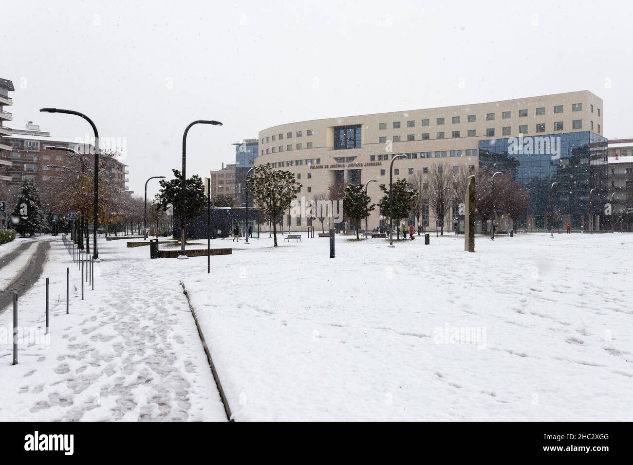 Pamplona, Spain - November 28, 2021 - Plaza Juez Elio square and Palace of Justice snowing. Stock Photo