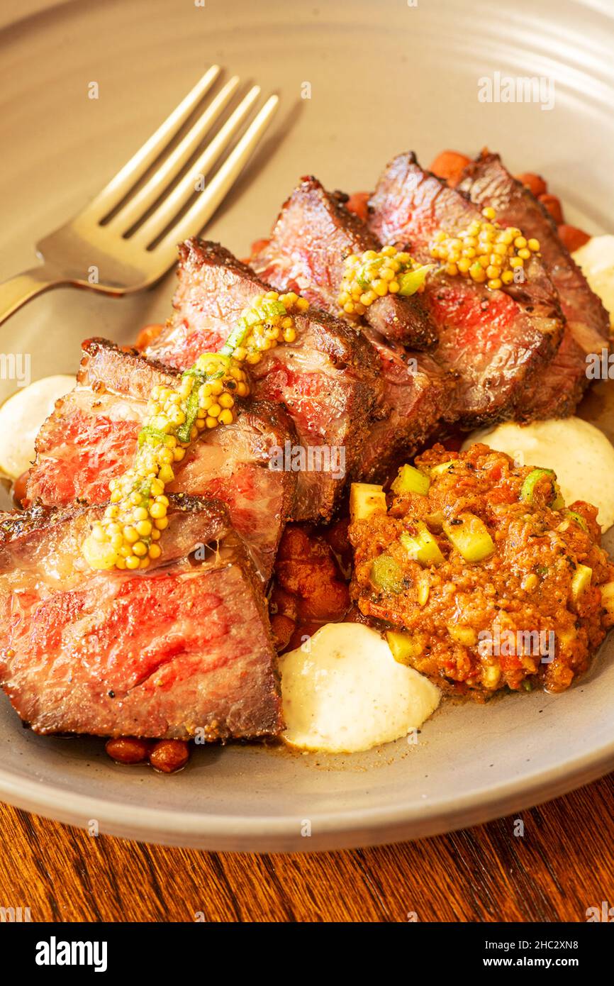 Santa Maria style Tri-tip with salsa and pinquito beans Stock Photo
