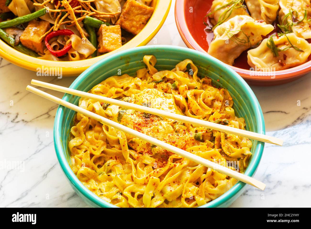 Northern Thai Curry Noodles, Hangover Noodles and Mama's Hand-wrapped Jiaozi Potstickers, Barbara, California Stock Photo