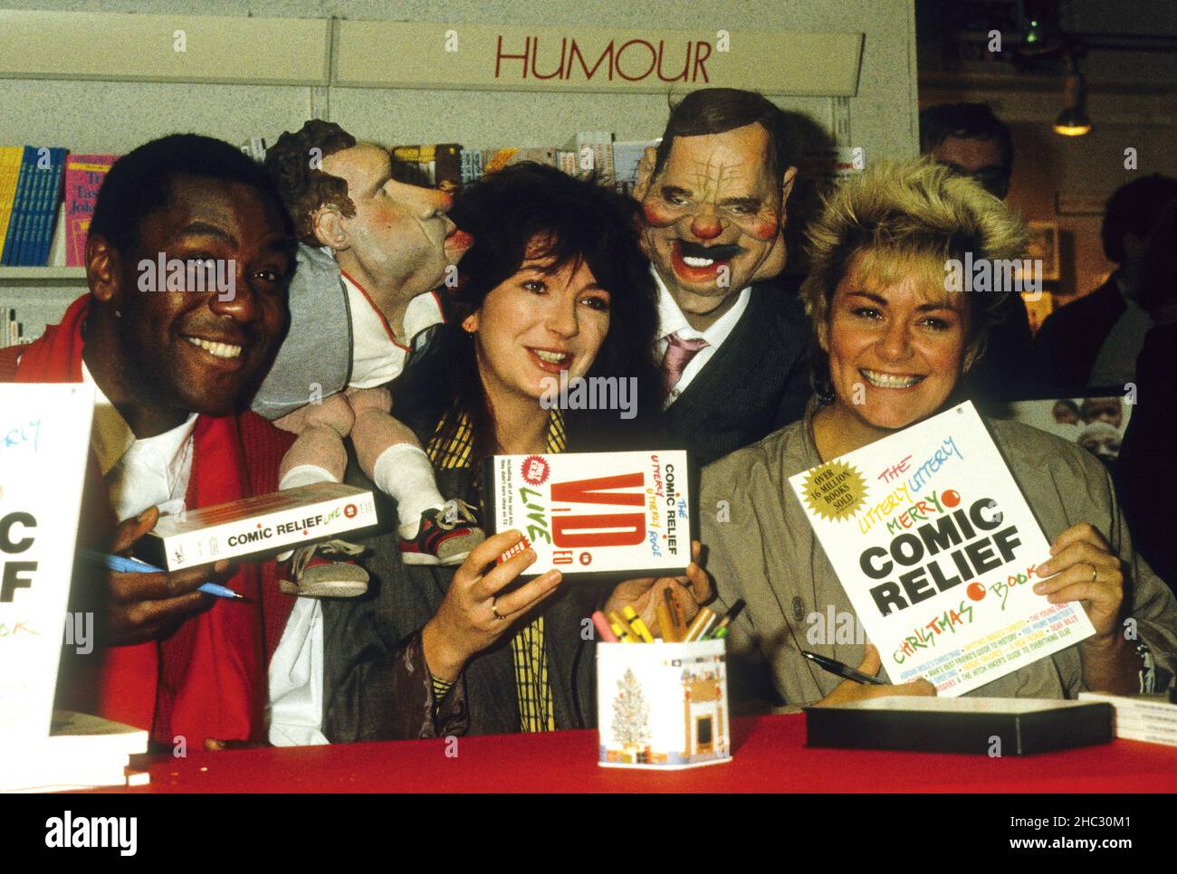 Lenny Henry, Kate Bush and Dawn French launching Comic Relief book 1986 Stock Photo