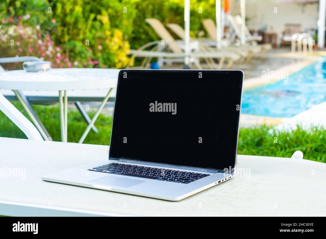 computer on table background as a pool Stock Photo - Alamy