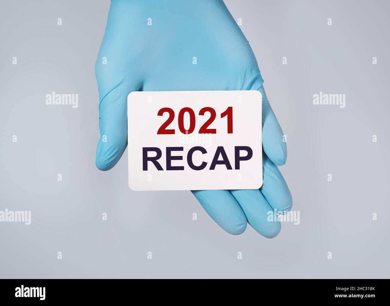 2021 recap, medical health review concept in hands. Stock Photo