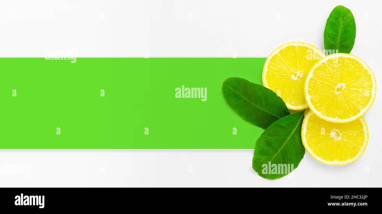 Creative composition layout background mock up with ripe lemons and leaf. Flat lay, copy space Stock Photo
