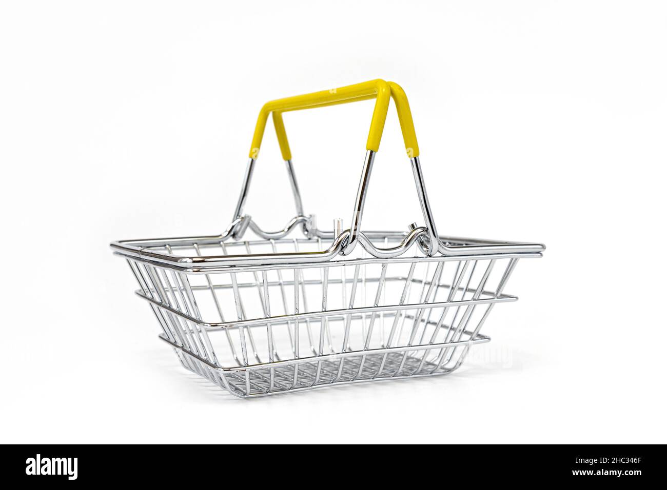 steel shopping basket isolated on white background, side view Stock Photo