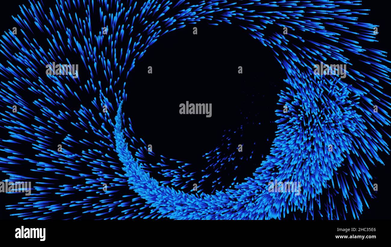 Blue abstract glitter trail flying in a spiral on black background ...