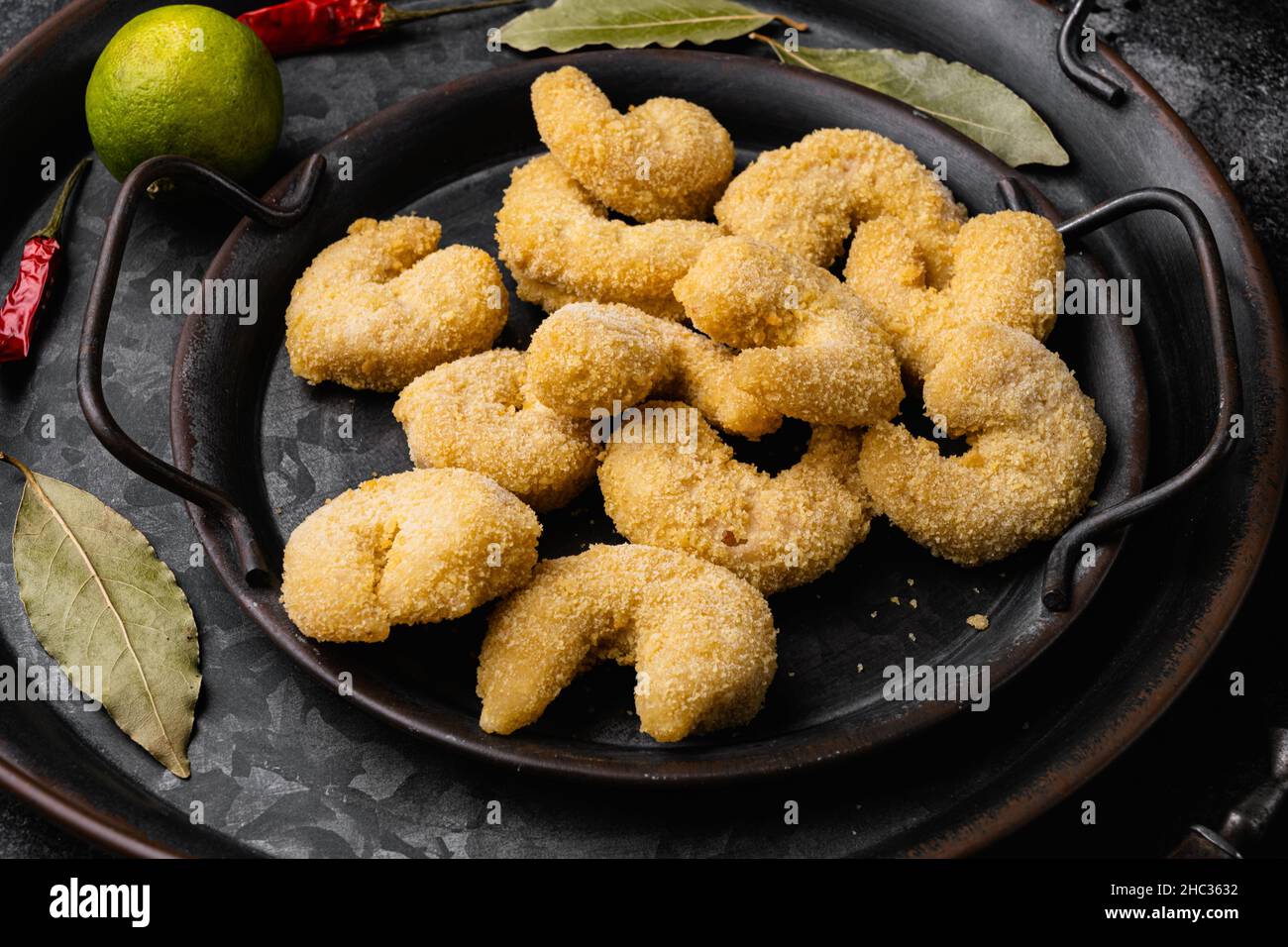 Breaded Deep Fried shrimps set, on black dark stone table background ...
