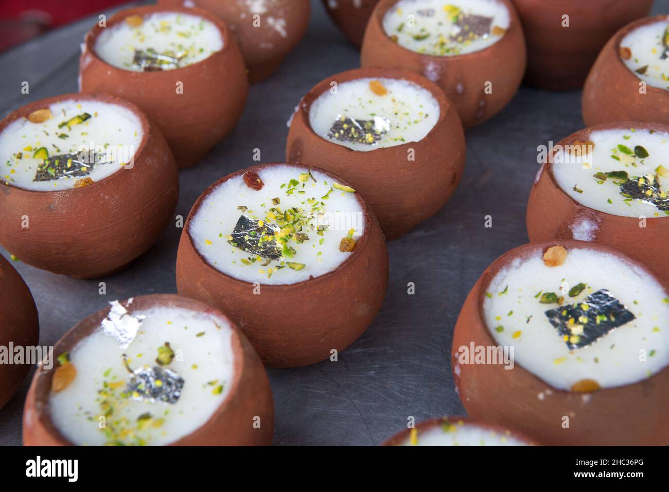 Pots of lassi at a food hotel in the old city of Delhi Stock Photo
