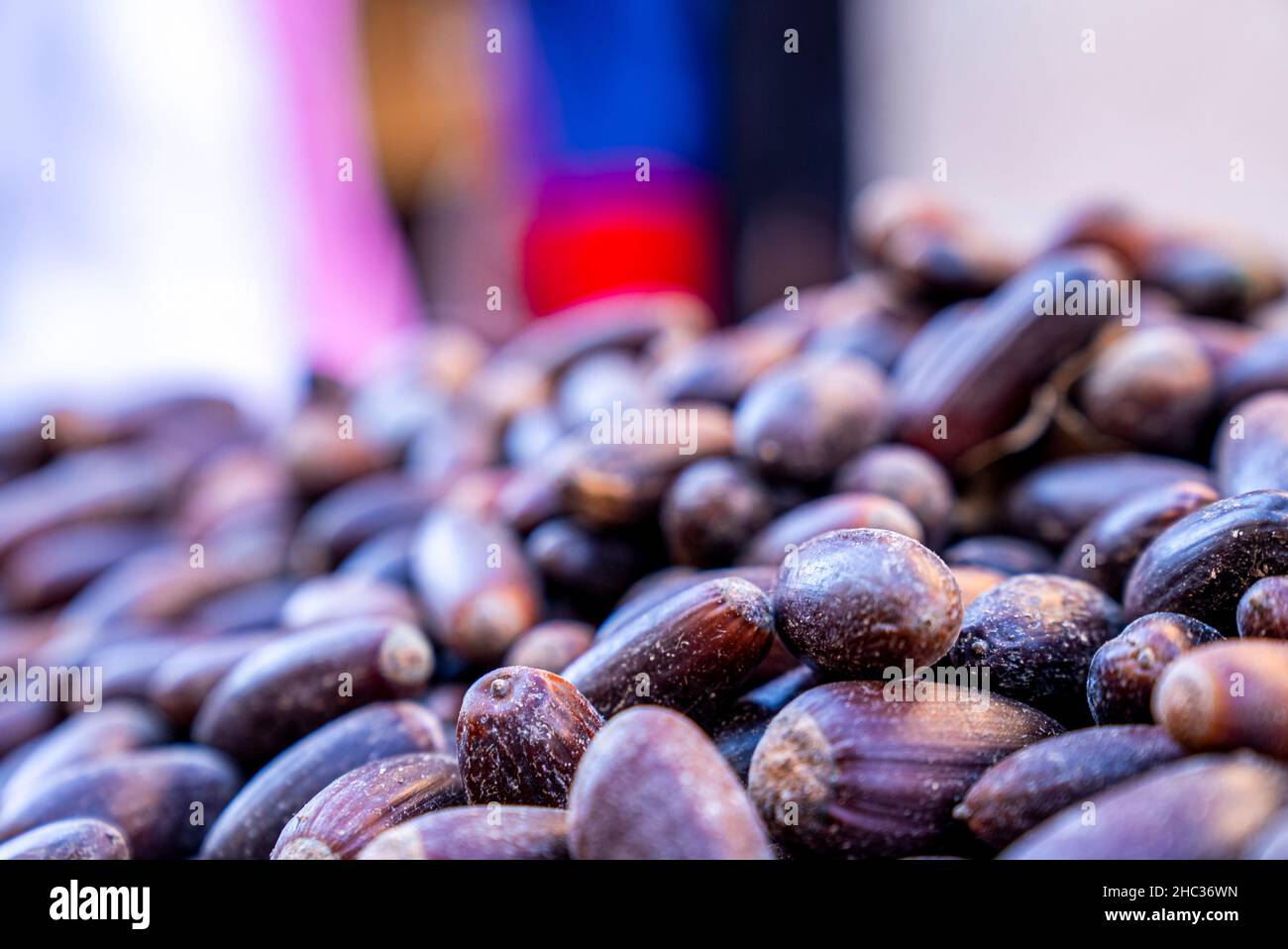 Pile of argan nuts and seeds for selling on street marketplace Stock