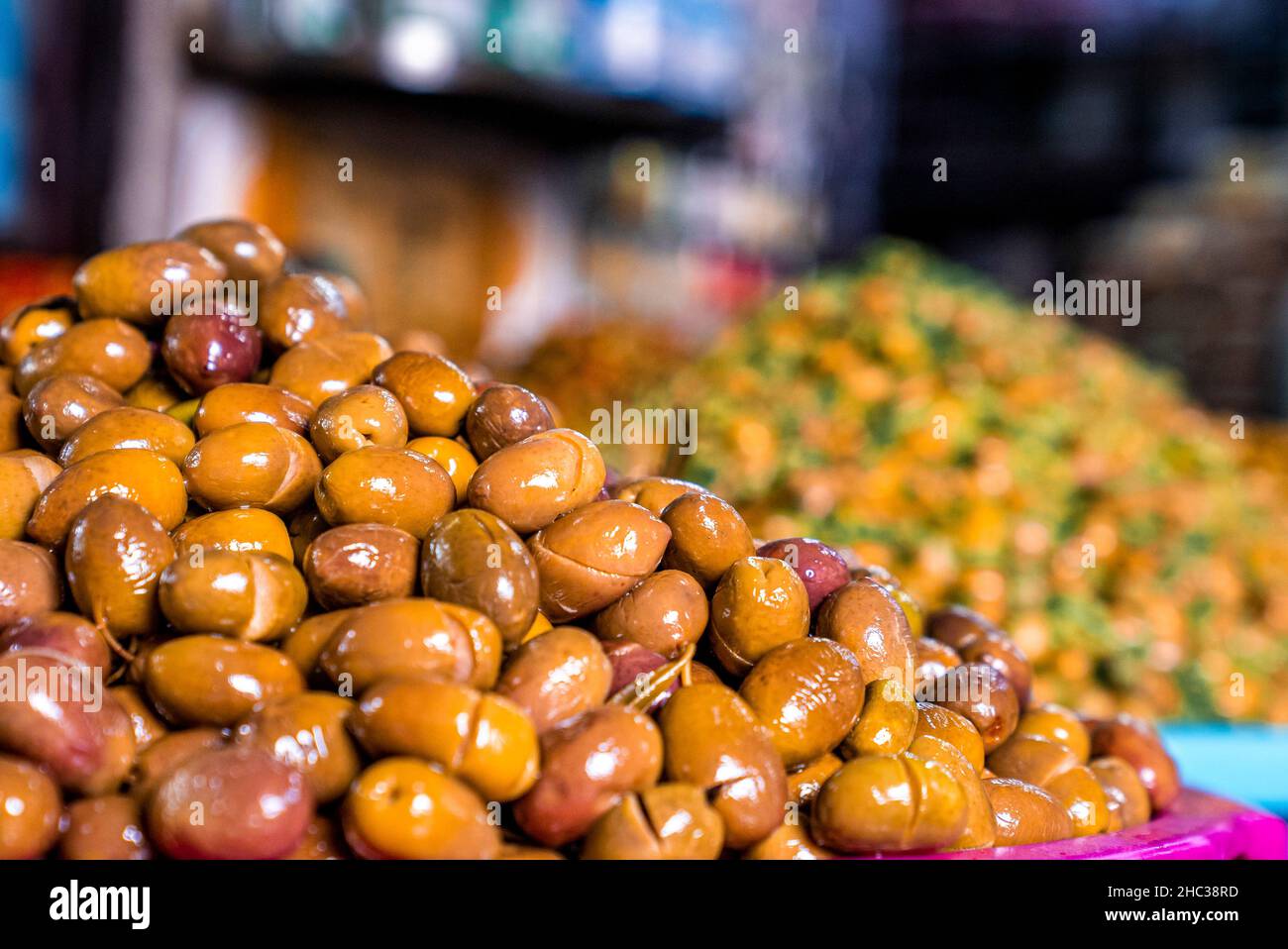 Pile of argan nuts and seeds for selling on street marketplace Stock