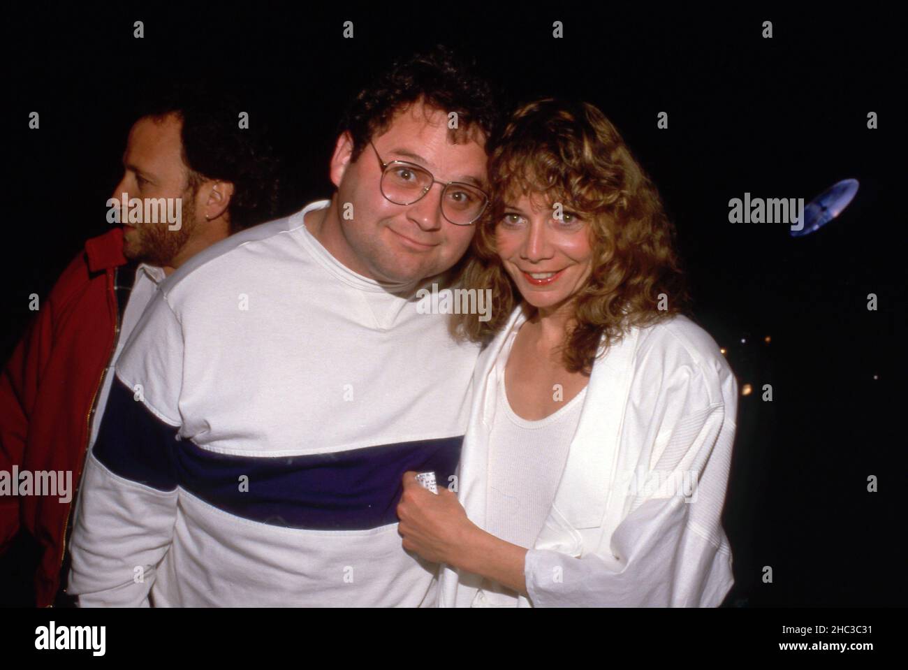Stephen Furst and wife Lorraine Wright attend the premiere of A Fine Mess' on March 19, 1986 at the Comedy Store in Hollywood, California  Credit: Ralph Dominguez/MediaPunch Stock Photo