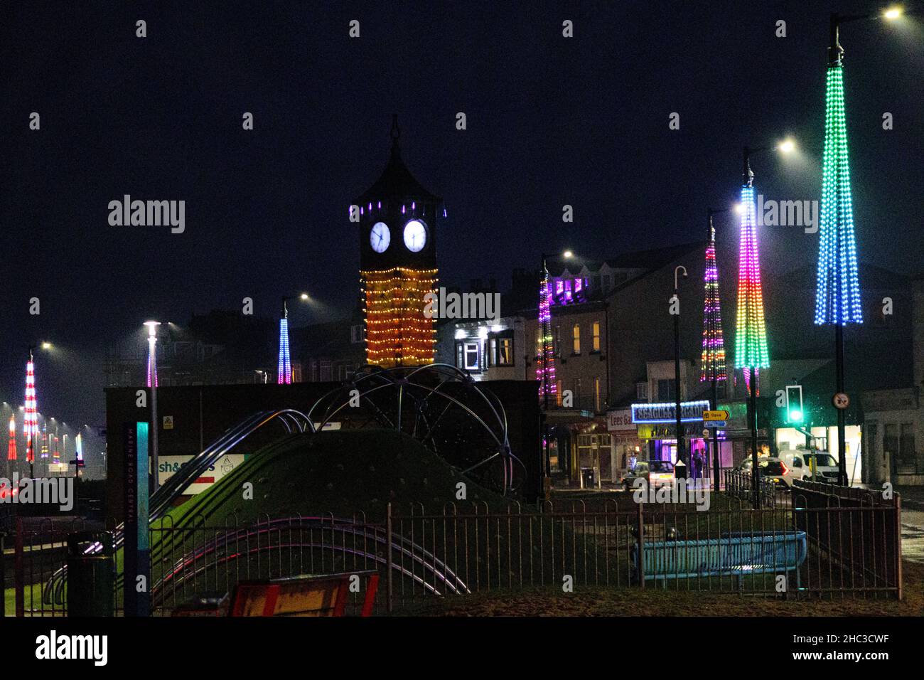 Morecambe, Lancashire, United Kingdom 23rd December 2021 Morecambe is being lit up by extra seasonal lighting this Christmas which is part of the 2021 Morecambe Business Improvement District (BID) Sparkle, A preview of what can be done if funding from the Welcome Back Fund and Lancashire County Council can be secured, From 1919 until 1996 until budget cuts and safety issues caused them to be cancelled Morecambe host its own illuminations. The Current scheme will see low energy programable LED lights which will illuminate Queen, Nelson, Pedder, Market and Victoria St Stock Photo