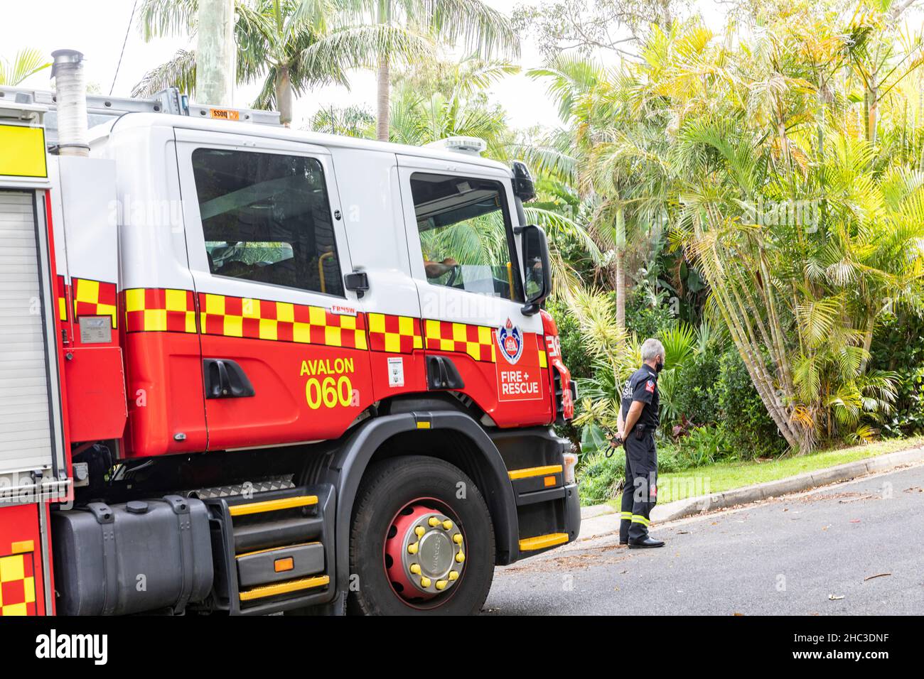 Avalon Beach suburb in Sydney, NSW Fire and Rescue personnel, fire brigade, attend to an incident on Christmas Eve,Sydney,Australia Stock Photo