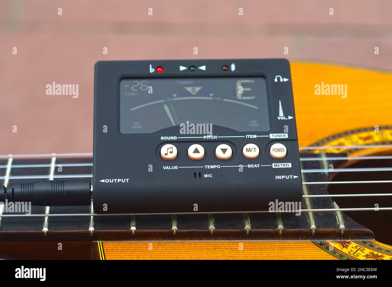 Electronic tuner for guitars Stock Photo