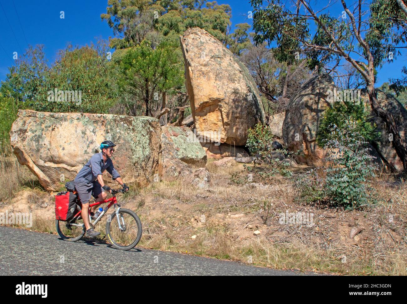 Cycling on the slopes of Mt Alexander along the Goldfields Track Stock Photo