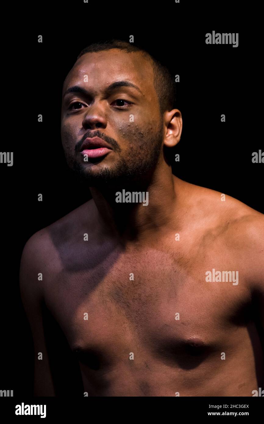 Actor on stage represents a dramatic character. Scene in a theater in ...