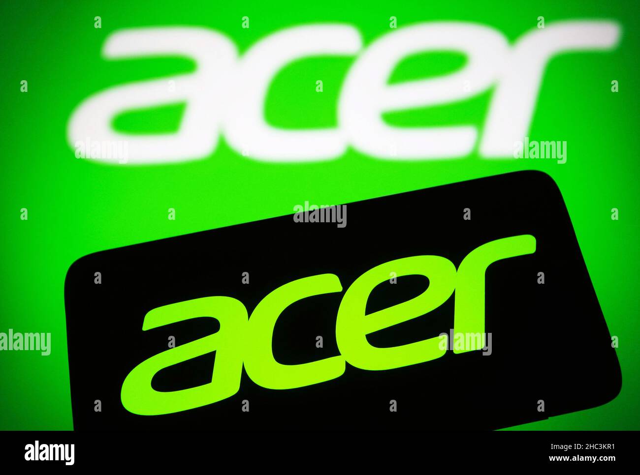 Ukraine. 23rd Dec, 2021. In this photo illustration, an Acer Inc. logo is seen on a smartphone and a computer screen. Credit: SOPA Images Limited/Alamy Live News Stock Photo