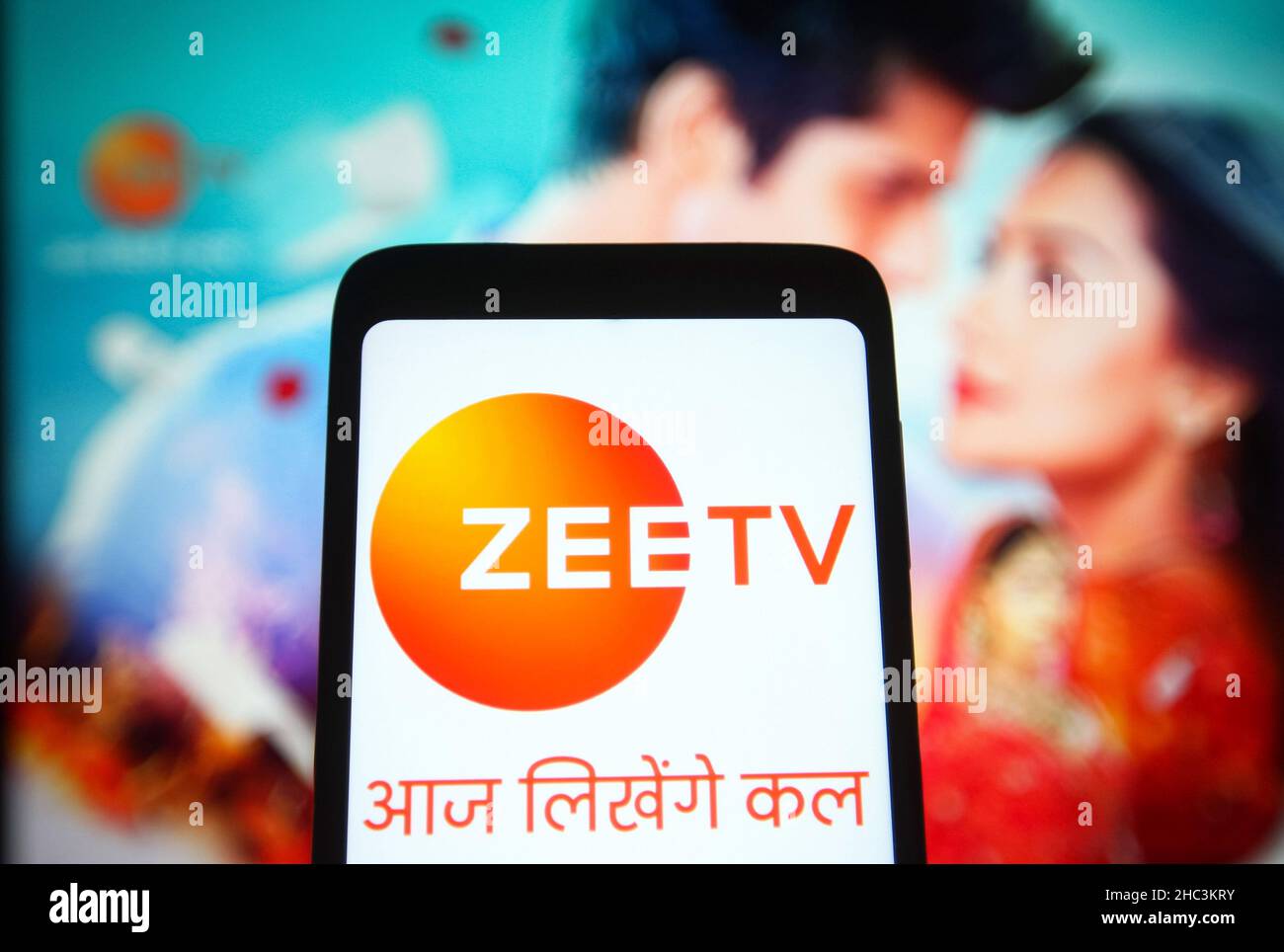Ukraine. 23rd Dec, 2021. In this photo illustration, a Zee TV logo of a Indian entertainment television channel is seen on a smartphone screen in front of its Facebook webpage. Credit: SOPA Images Limited/Alamy Live News Stock Photo