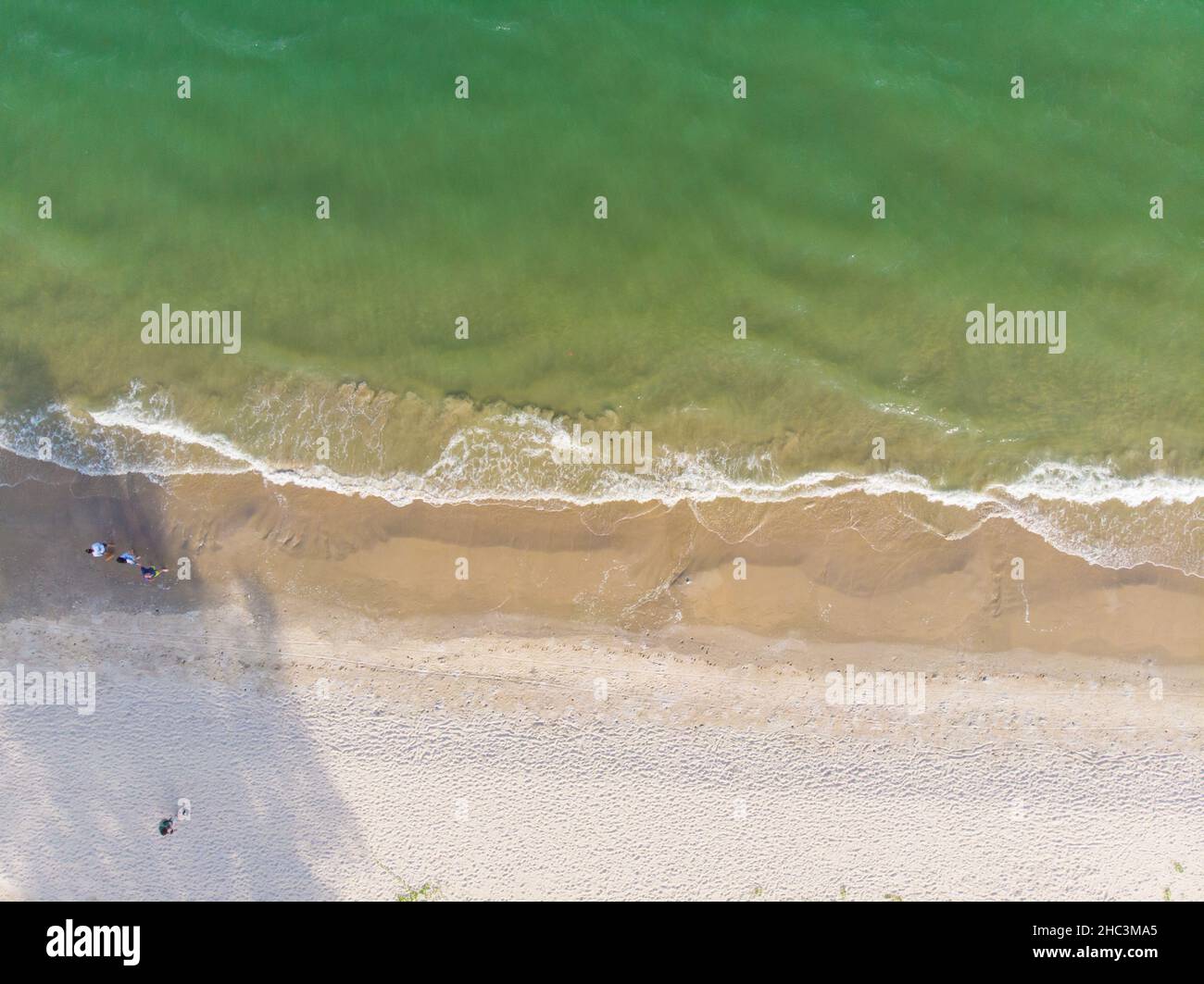 Aerial view tropical white sand beach turquoise water with tourist ...