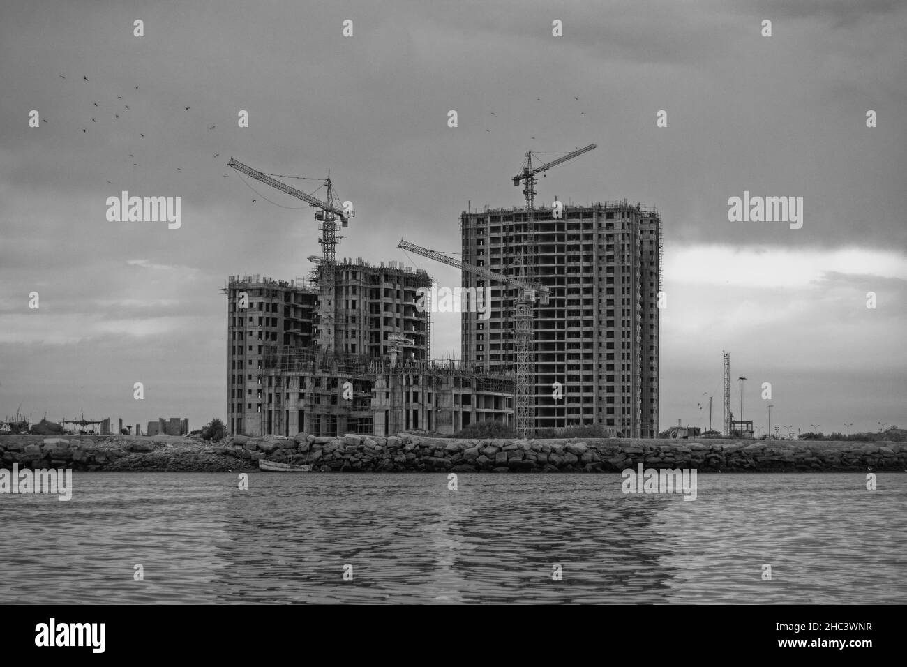 High rise construction with cranes Black and White Stock Photos ...