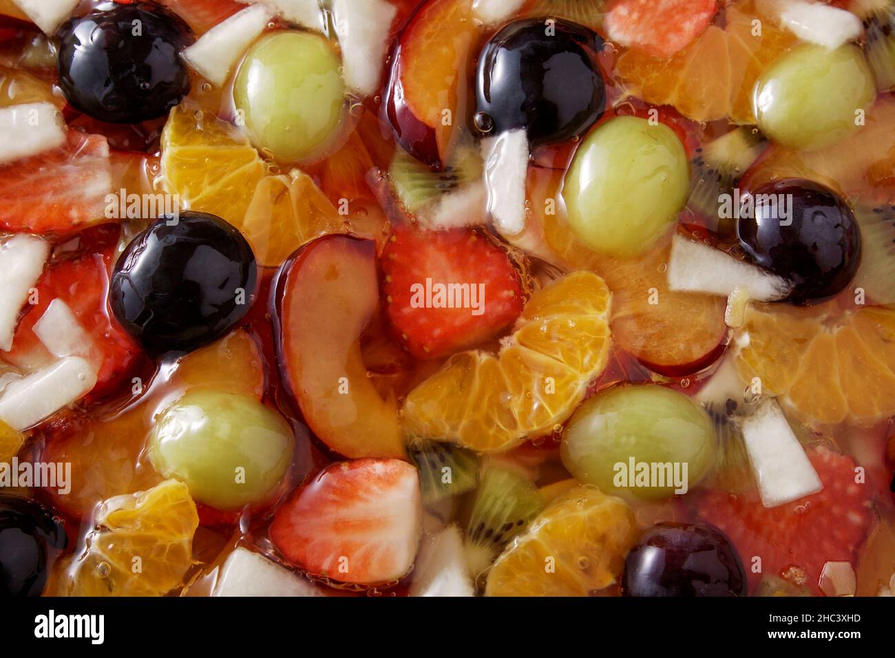 Fruit cake with cake topping from above Stock Photo Alamy
