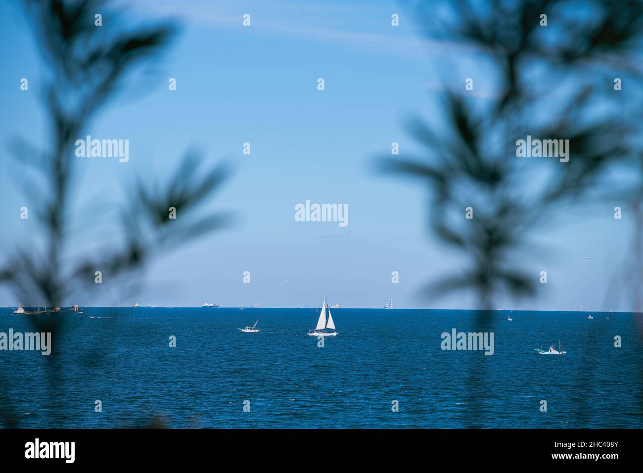 Boats sailing in the ocean in Japan Stock Photo Alamy