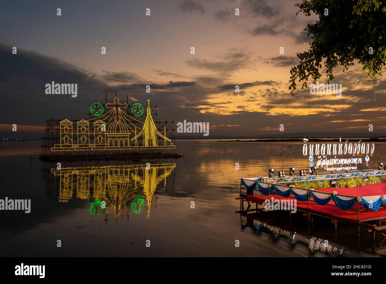 21 Dec  2021 Tha Rae Sakon Nakhon, Thailand.Christians decorate their boats with lights and stars to welcome the Christmas season. Tha Rae is Thailand Stock Photo