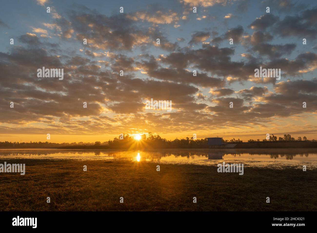 Beautiful lake sunrise in the morning Stock Photo