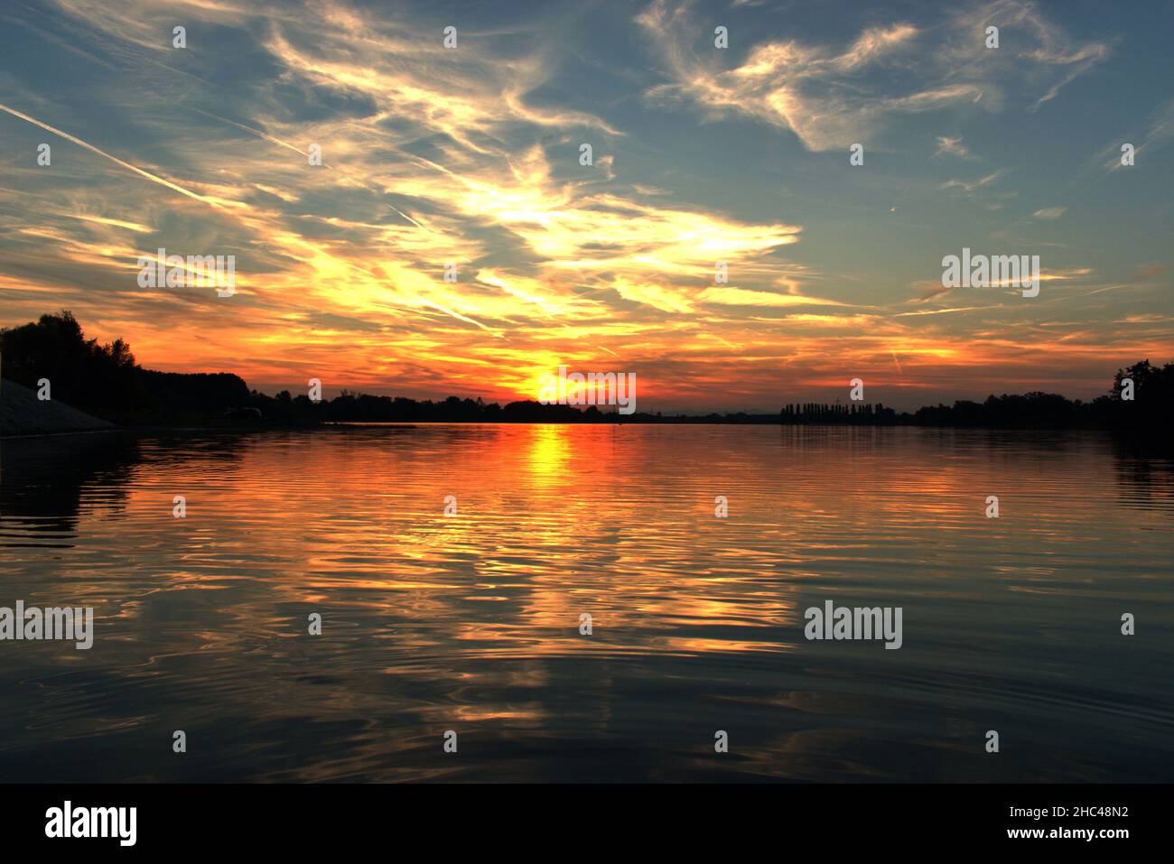 Sunset at the sea Stock Photo - Alamy
