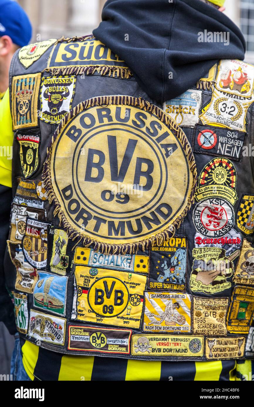 Stickers on a fan jacket. BVB09 Borussia Dortmund football club fans celebrate in Trafalgar Square before the Champions League game on 25 May 2013. Stock Photo