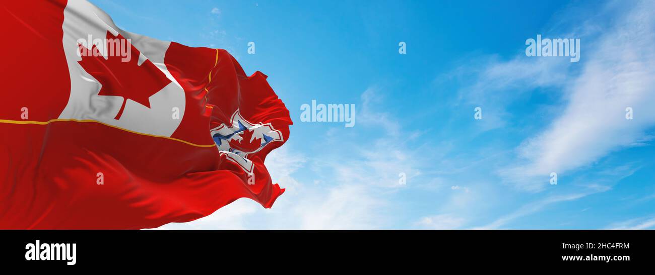 flag of Canadian Army  1968 1998  , Canada at cloudy sky background on sunset, panoramic view. Canadian travel and patriot concept. copy space for wid Stock Photo