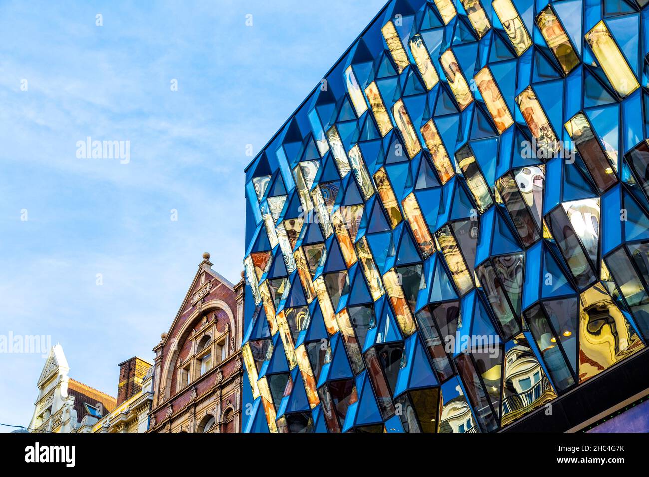 Contemporary glass facade with jewellike shapes at 187195 Oxford