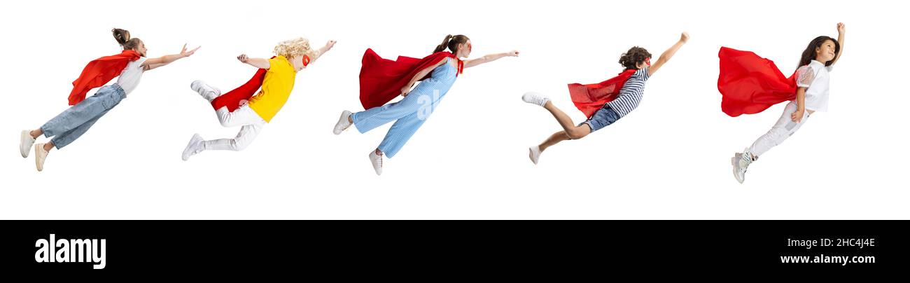 Collage of little children in character of superhero wearing red mantle isolated over white background Stock Photo