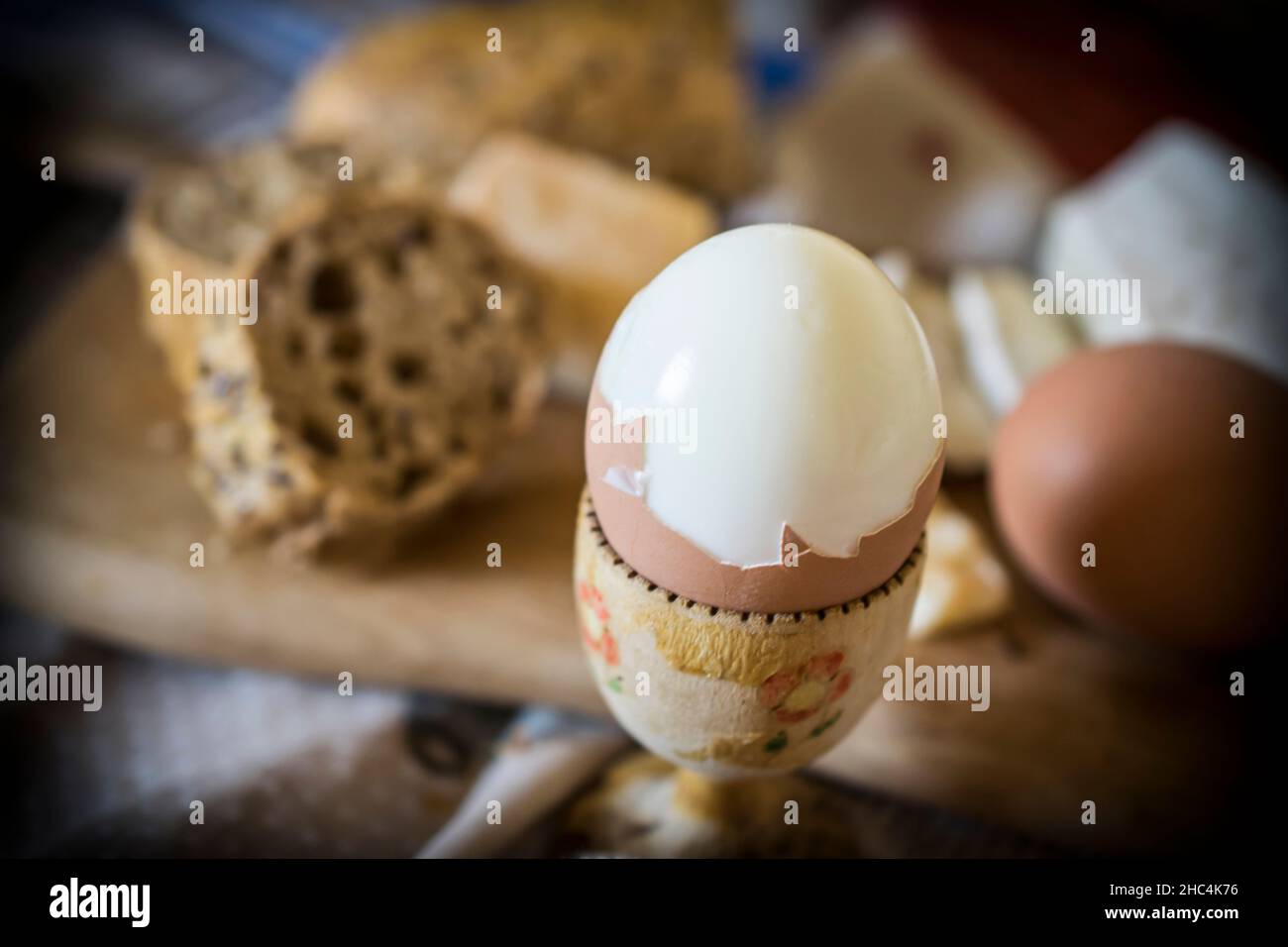 A rustic breakfast with boiled eggs and bread Stock Photo