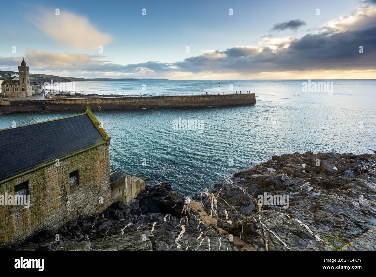 Evening light at the harbour entrance Porthleven Cornwall England UK Stock Photo